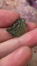 Load and play video in Gallery viewer, Moldavite 66 - 1.4 grams