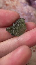 Load and play video in Gallery viewer, Moldavite 66 - 1.4 grams

