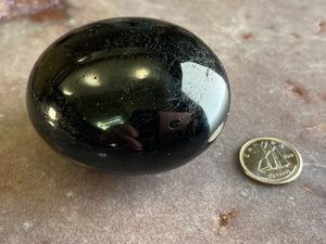 Black tourmaline palm stone (one)